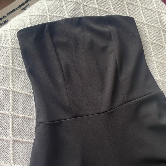 Black jumpsuit 
Hold up the chest with stopper - Picture 2 of 5